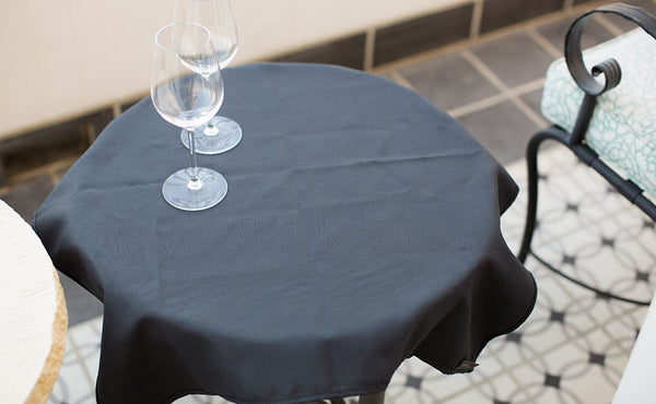A Shepherd's Wool Utility Cloth being used as a small tablecloth.